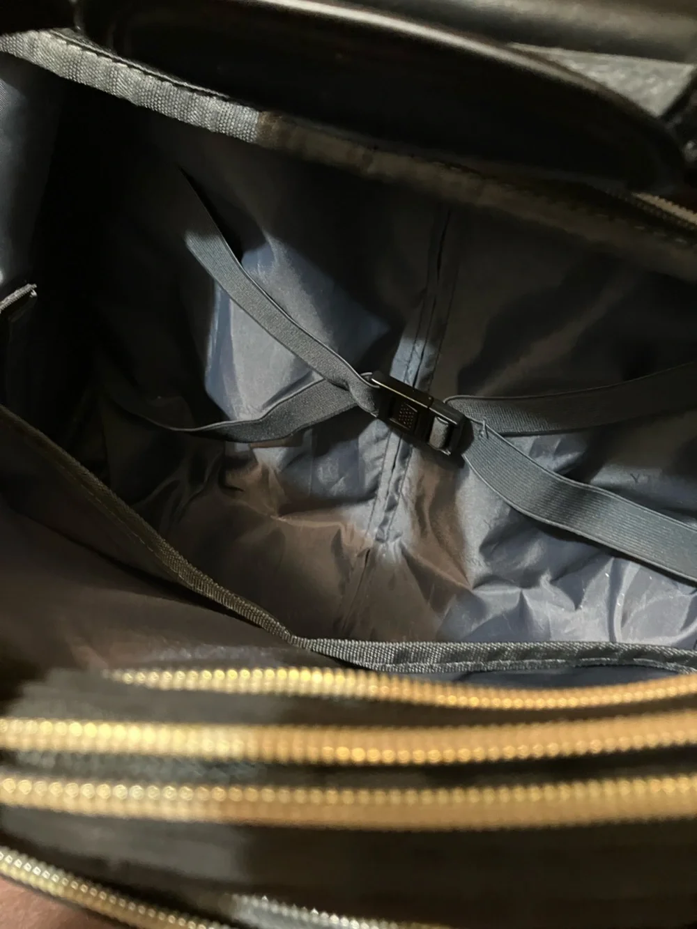 Quilted Black Rolling Travel Tote with Gold Accents